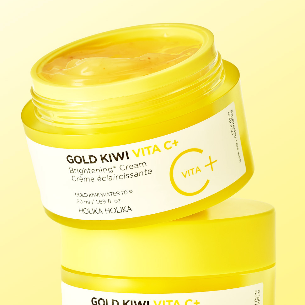 Open jar of HOLIKA HOLIKA Gold Kiwi Vita C+ Brightening Cream 50ml with a vibrant yellow design.