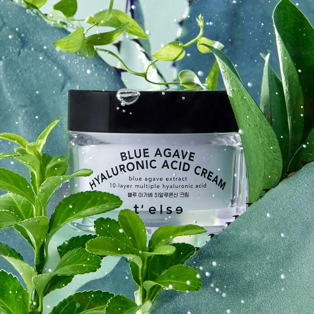 T'ELSE Blue Agave Hyaluronic Acid Cream 50ml with lush green leaves background