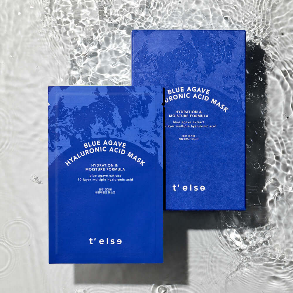 T'ELSE Blue Agave Hyaluronic Acid Mask 5 Pack displayed on a watery surface, showcasing hydration and moisture formula packaging.