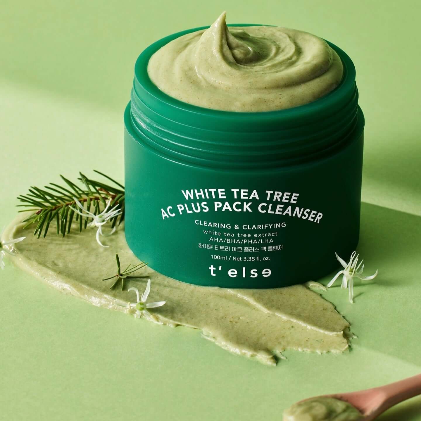 T'ELSE White Tea Tree Arc Plus Pack Cleanser 100ml - Green jar with creamy cleanser on textured background.
