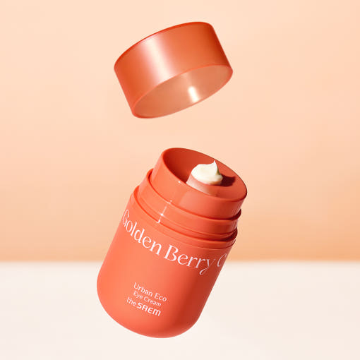 THE SAEM Urban Eco Golden Berry C Eye Cream 30ml in open tube with cream visible against peach background