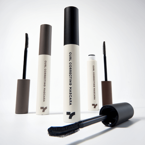 TONY MOLY Eyetone Curl Correcting Mascara bottles and wands displayed on a white background.