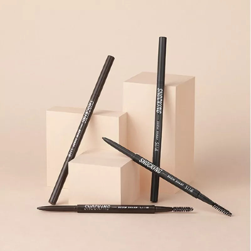TONY MOLY The Shocking Vegan Brow Sharp Slim pencils displayed on beige background.