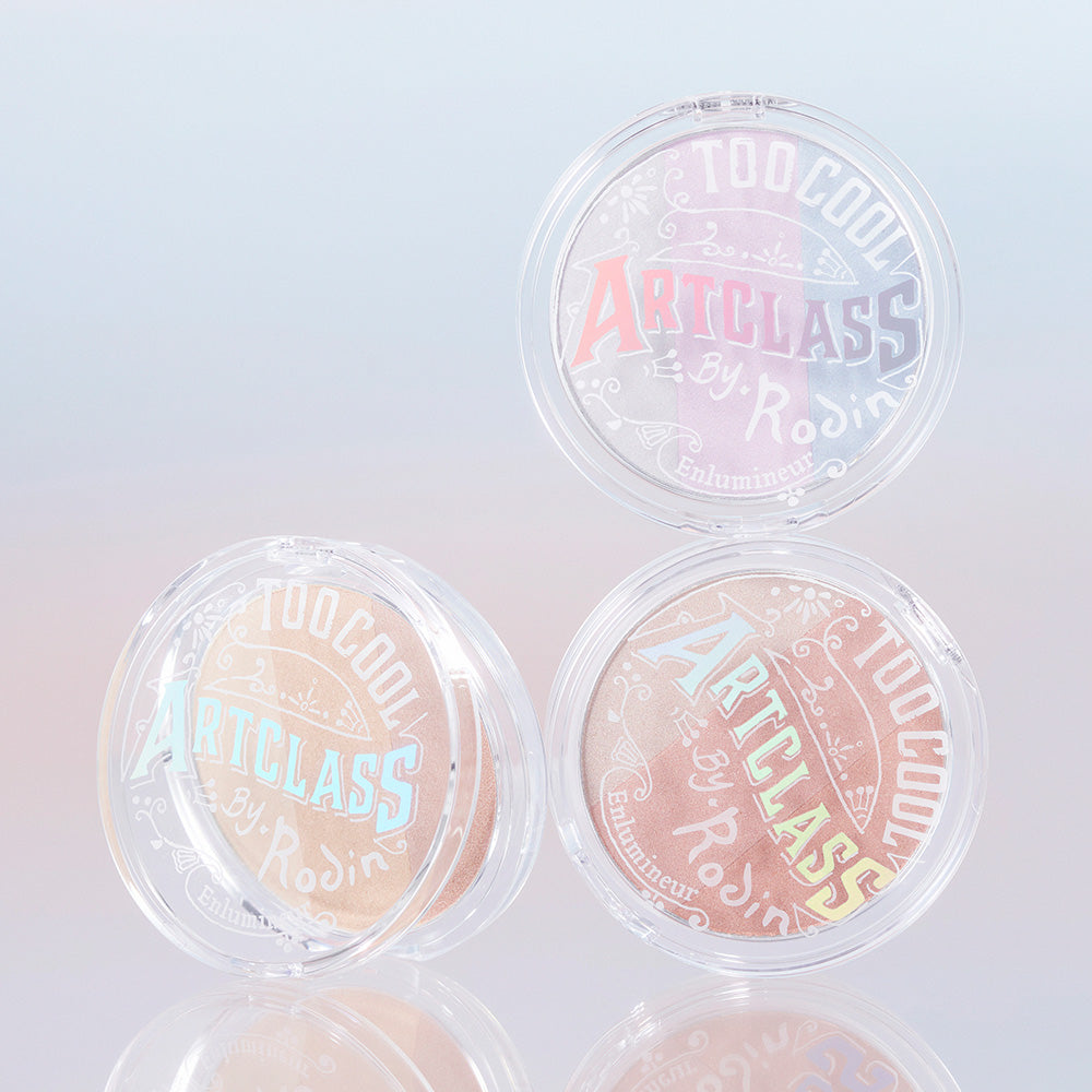 TOO COOL FOR SCHOOL Art Class By Rodin Highlighter compact set with three shades displayed on a reflective surface