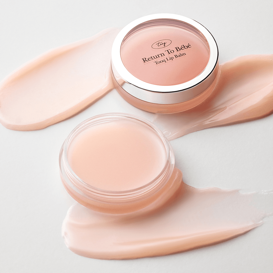 TOOQ Return To Bèbè Lip Balm in open containers with smooth creamy texture.