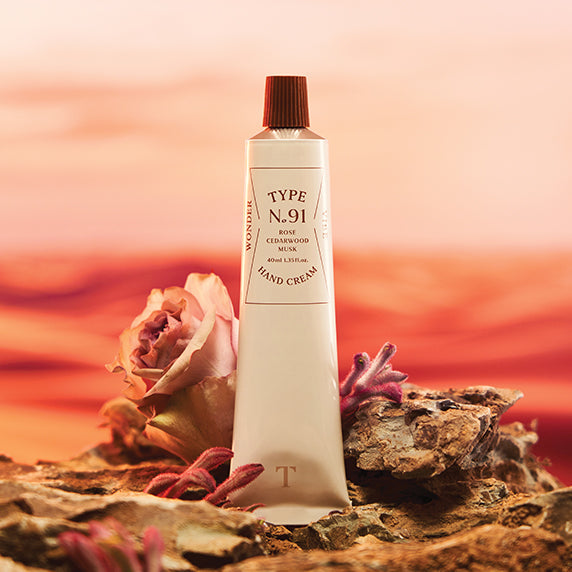 TYPE NO. No.91 Wonder Vibe Handcream 40ml displayed with a natural background and floral elements.