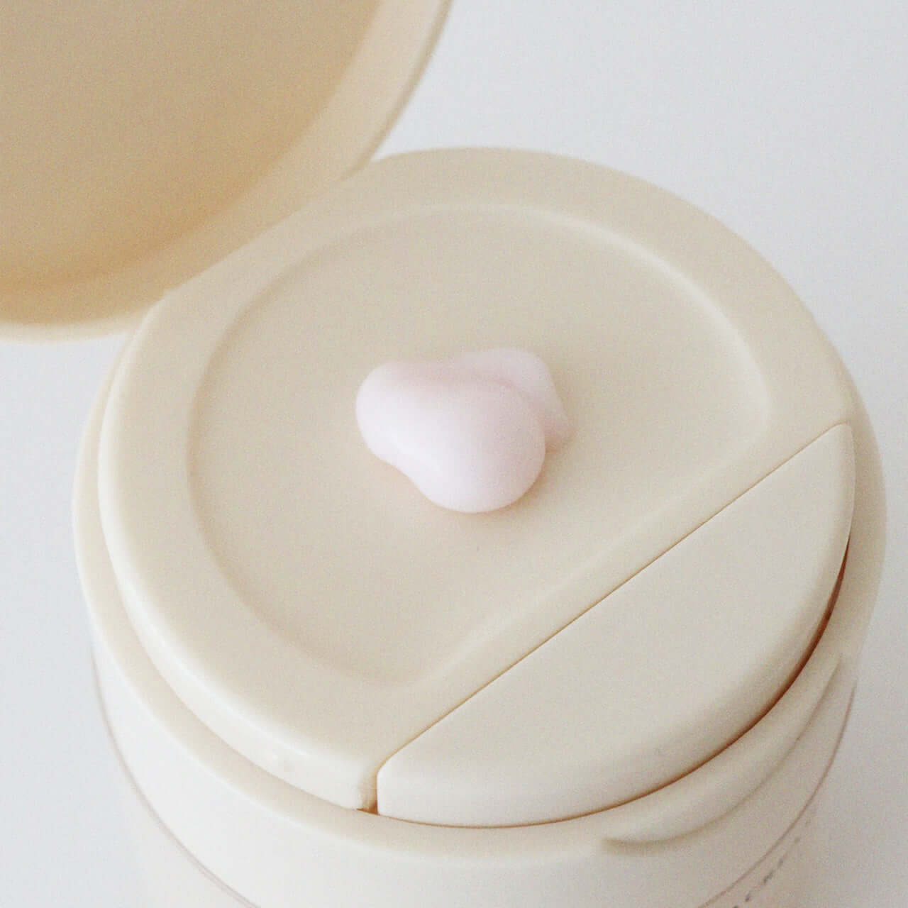XOUL Layered Cream 50g in an open container, showing texture and packaging detail.