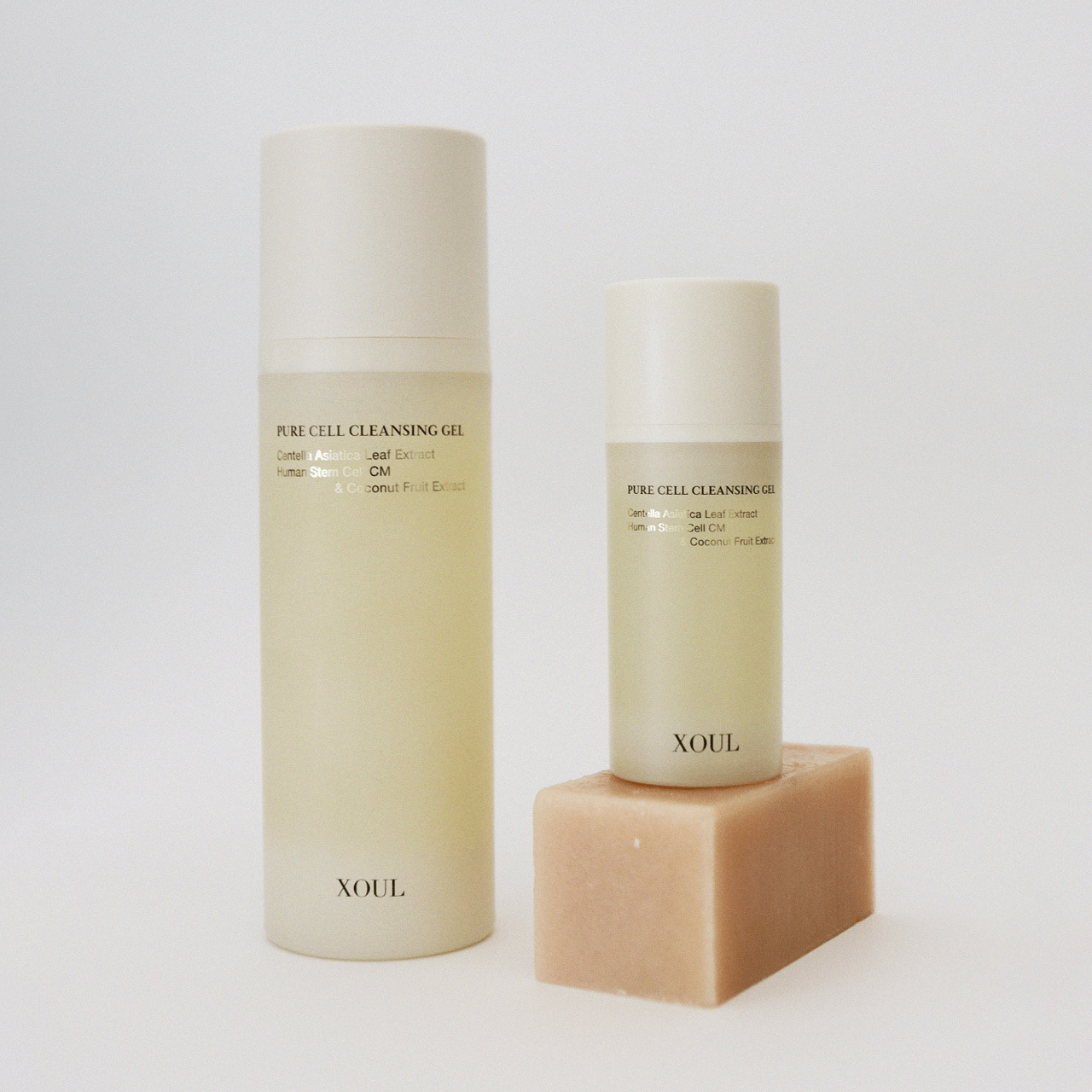 XOUL Pure Cell Cleansing Gel 130ml bottles displayed on soap bar showcasing skincare product