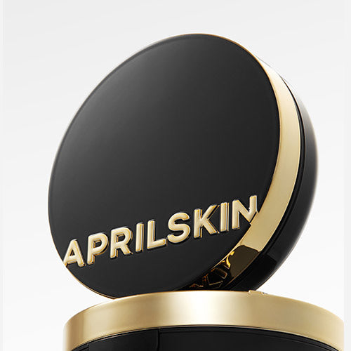 Close-up of APRIL SKIN Magic Snow Cushion 3.0 with sleek black and gold packaging.