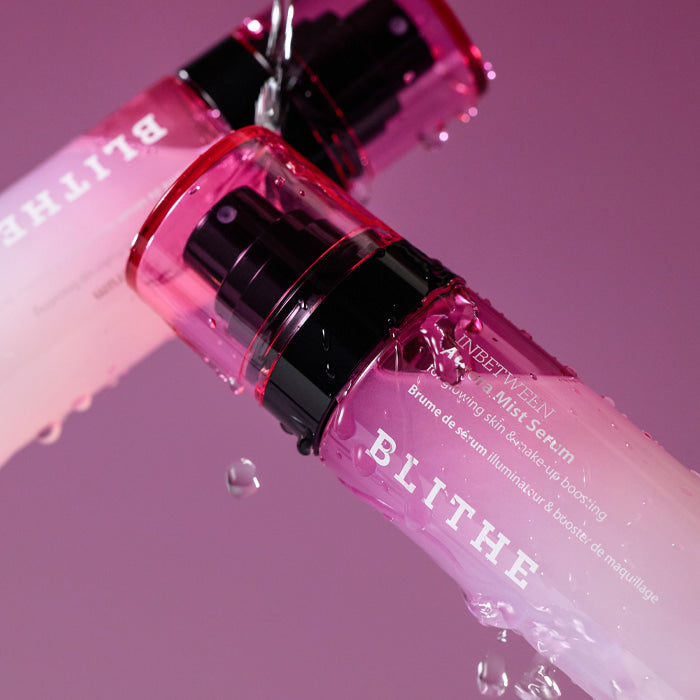 BLITHE Inbetween Aurora Mist Serum 82ml product packaging with vibrant lighting and water droplets showcasing the skincare mist's hydrating effect.