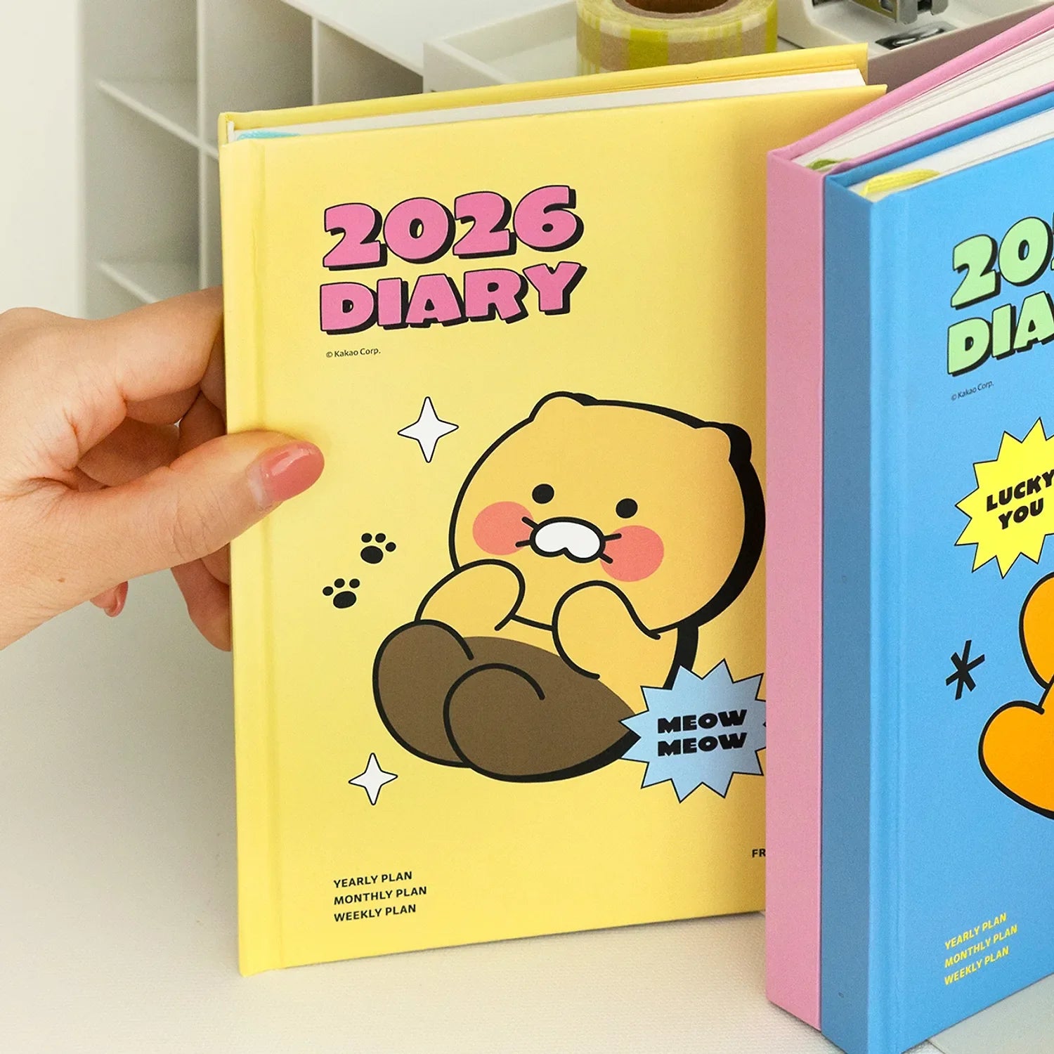 KAKAO FRIENDS Planner 2026 with cute character design in yellow, perfect for organizing your yearly, monthly, and weekly plans.