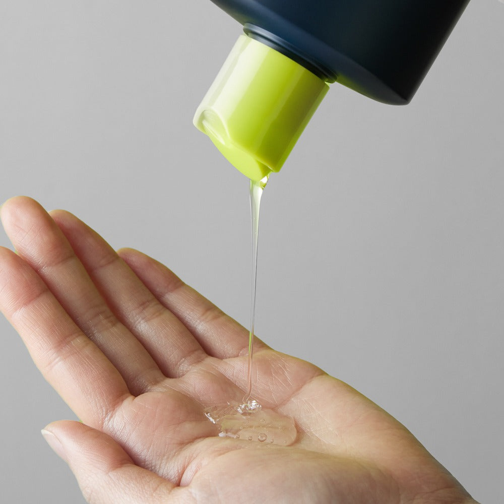 BRTC Homme Active Max Hair & Body All-Round Wash 200ml pouring clear gel into a gentleman's palm — Gentleman Korea skincare for men