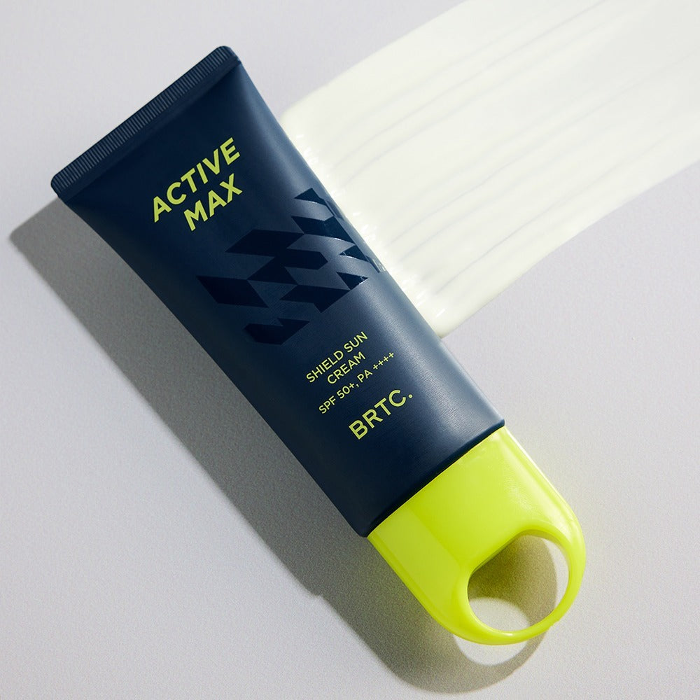 BRTC Homme Active Max Sheild Sunscreen 50ml tube on gray background with sunscreen swatch Gentleman Korea product image
