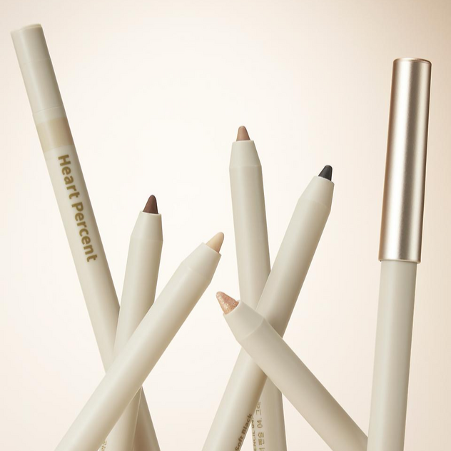 HEART PERCENT Dot On Mood Gel Eyeliner Pencil in various shades against a neutral background.