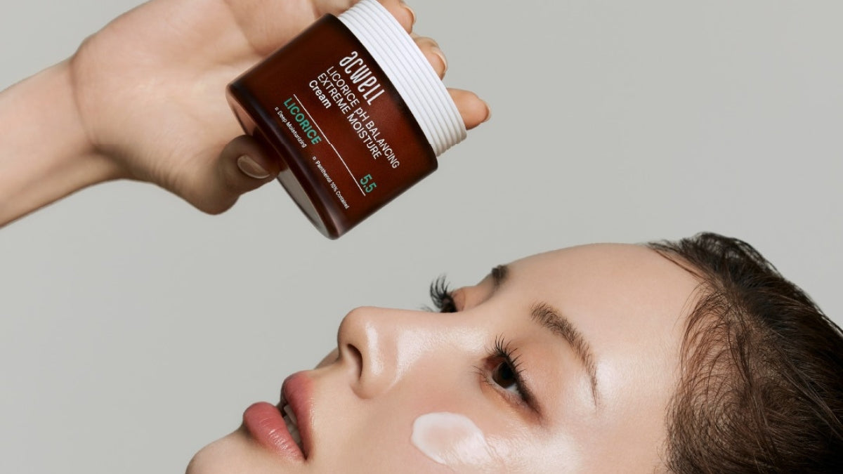 Unveiling the Korean Skincare Secret: Exploring the Magic of ACWELL, featuring a woman applying Acwell cream to her face.