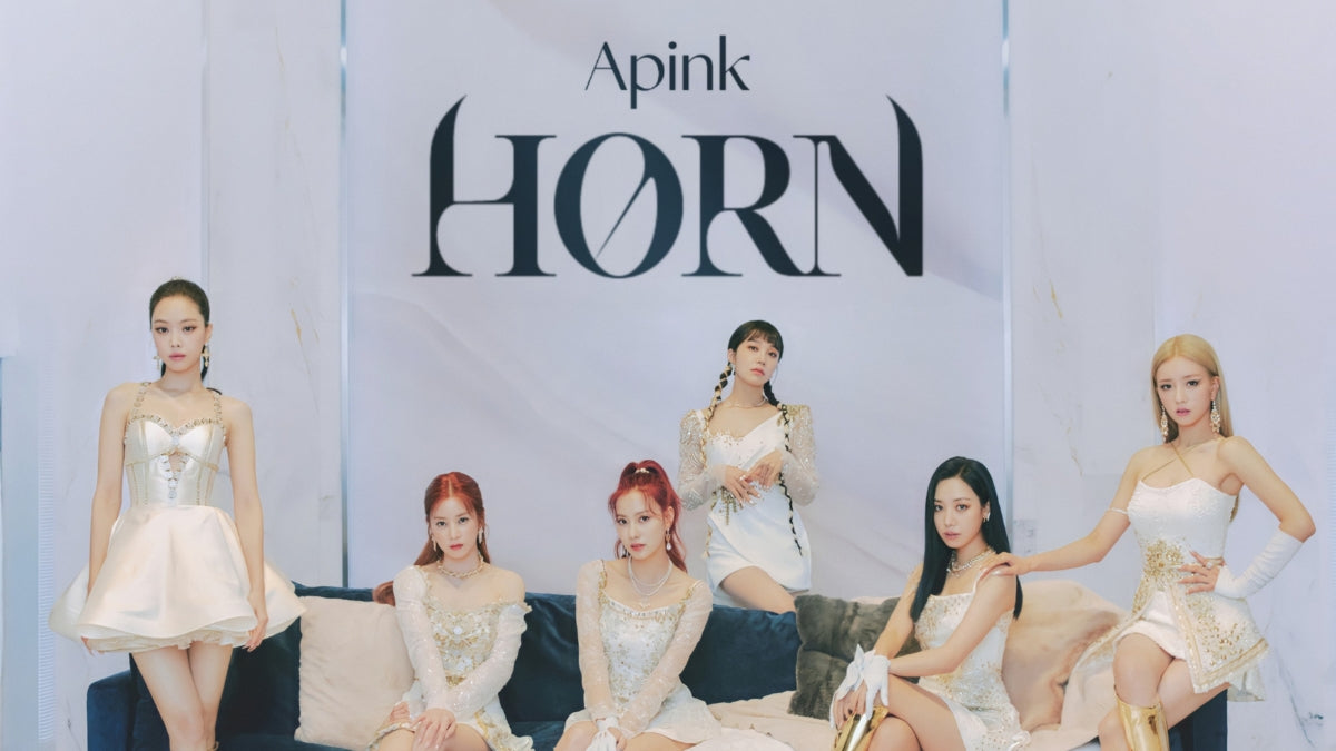 Apink dances through the K-pop scene like a burst of confetti, sprinkling joy and harmony wherever their pastel footsteps tread.