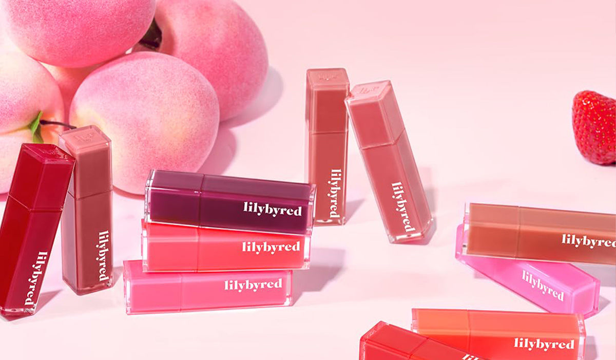 Unveil Your Best Look with LILYBRYRED: The Korean Cosmetic Brand You Need to Know - vibrant lipsticks and fruit background