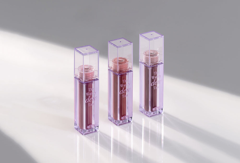 Three MERZY lip products on a white surface to Elevate Your Makeup Game with MERZY's Innovative Products.