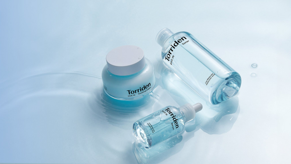 Exploring TORRIDEN The Journey to Radiant Skin Begins Here: Korean skincare products on a water backdrop.
