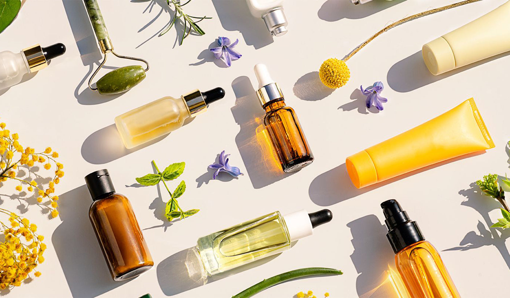 Skincare products showcasing Embracing Beauty: The Essence of a Cambodian Skincare Routine with oils and skincare tools.