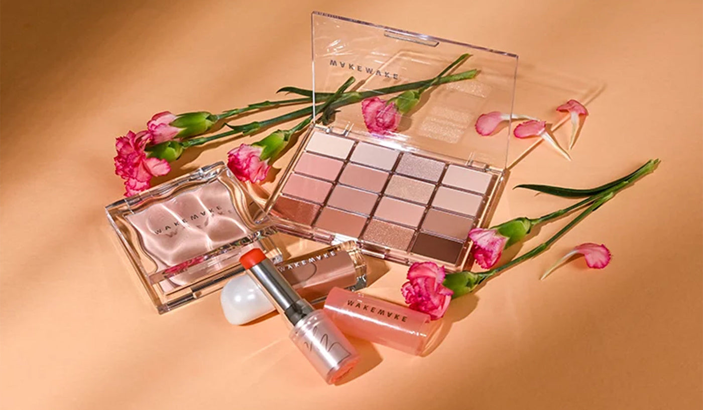 Embrace Beauty with WAKEMAKE: The Korean Cosmetic Brand Redefining Elegance. Makeup collection with flowers.