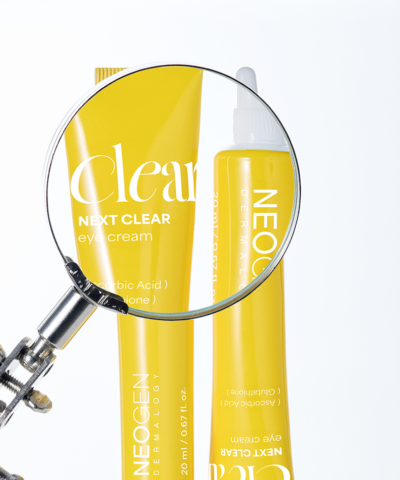 NEOGEN Next Clear Eye Cream 20ml with lens showcasing details.