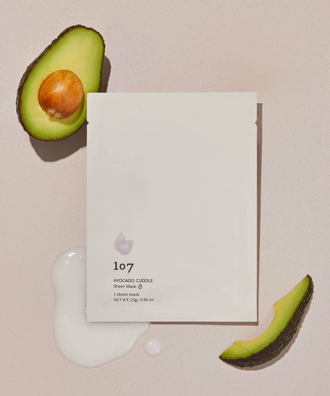 107 Avocado Curd Sheets Mask 5 Pieces displayed with avocado and lotion spill.