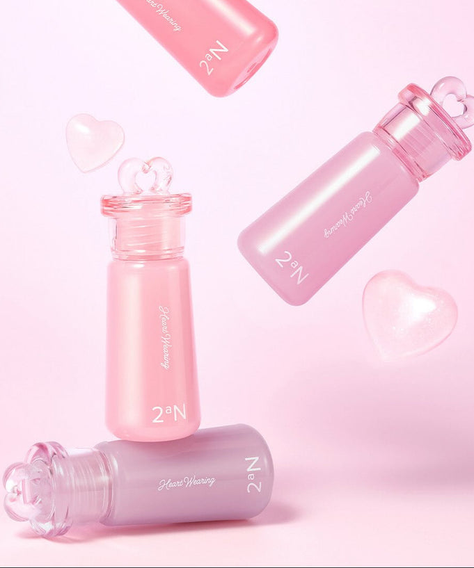 2AN Heart Wearing Liquid Cheek 4.4g bottles on pink background with hearts