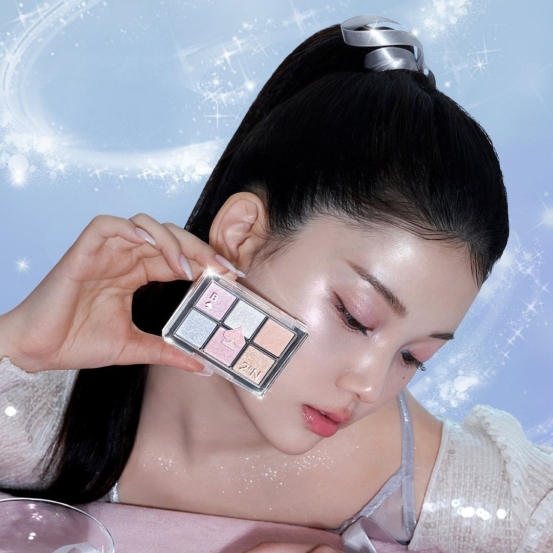 Model showcasing 2AN Better Me Eye Palette 4.5g with sparkling background.