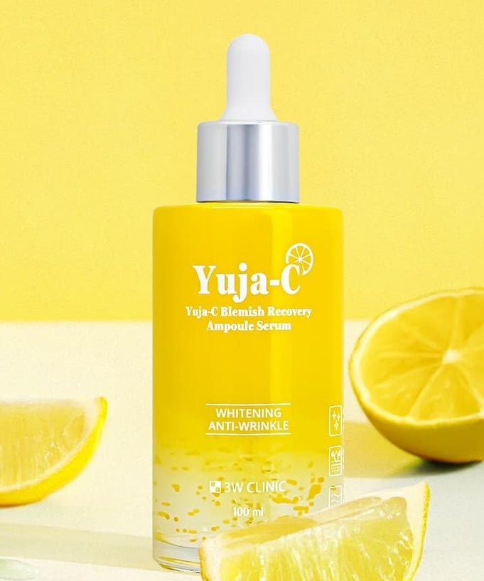 3W CLINIC Yuja C Blemish Recovery Ampoule Serum 100ml bottle with lemons on a yellow background