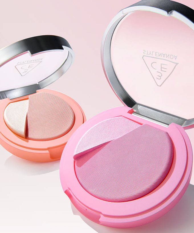 3CE Blushlighter compact showcasing dual shades of pink and peach, perfect for highlighting and blush application, on a pink background.