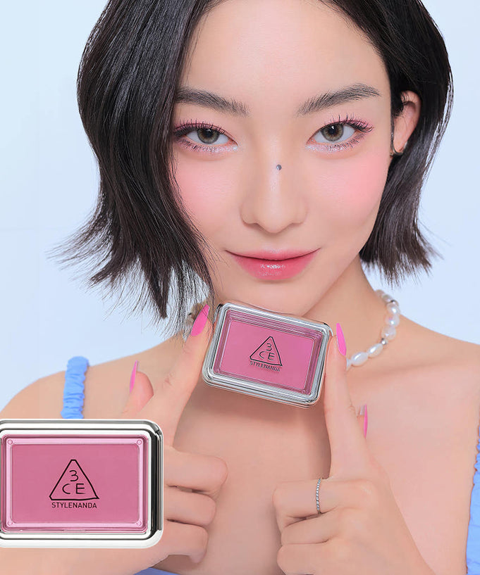 3CE New Take Face Blusher showcased with model demonstrating product color and packaging