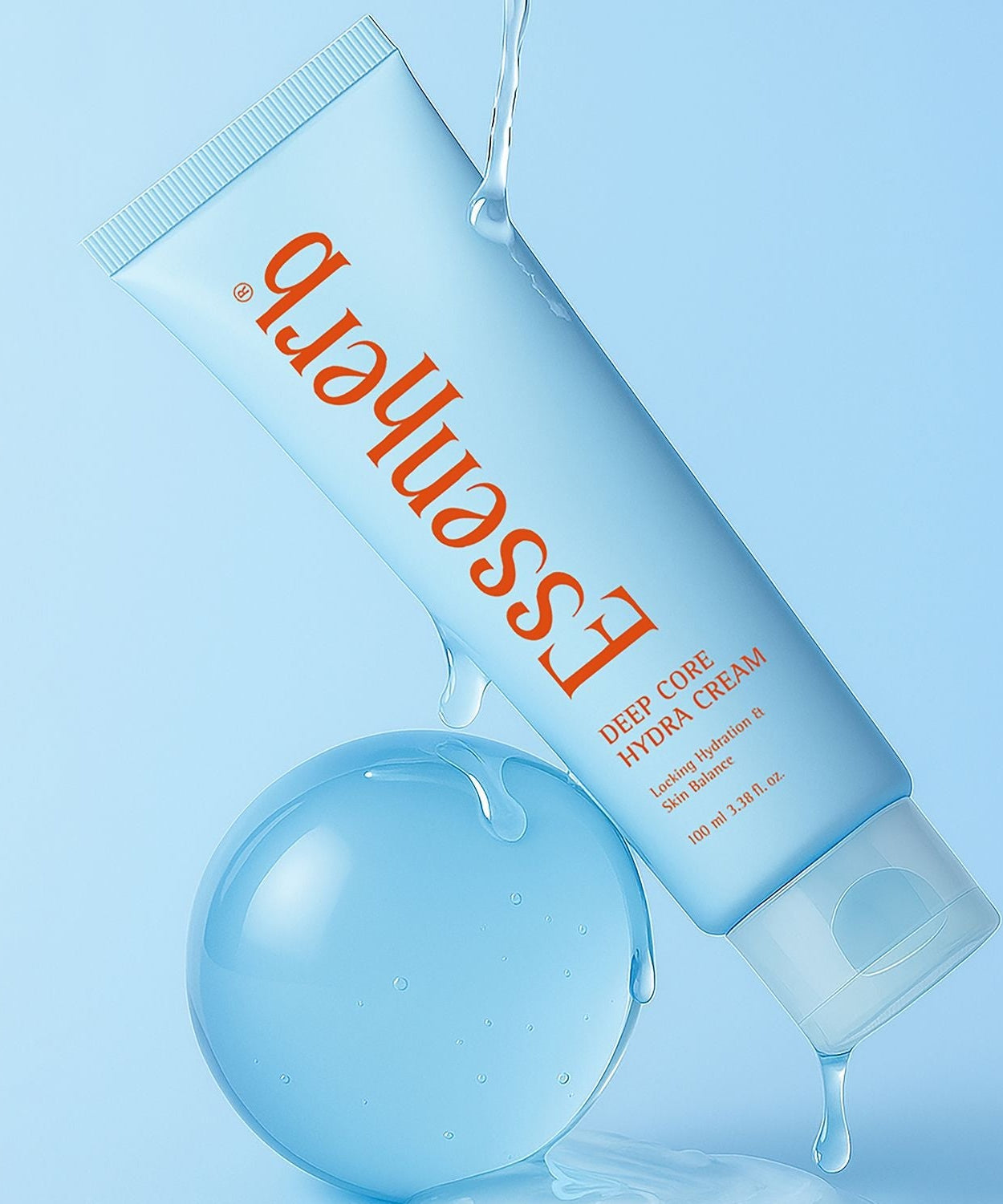 ESSENHERB Deep Core Hydra Cream 100ml tube with water droplets on a blue background