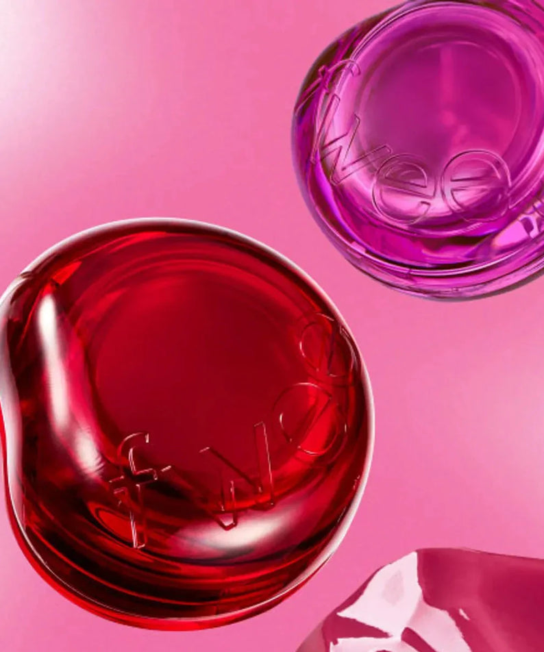 FWEE Lip & Cheek Glowy jelly Pot with vibrant red and purple shades, perfect for adding a pop of color to lips and cheeks.