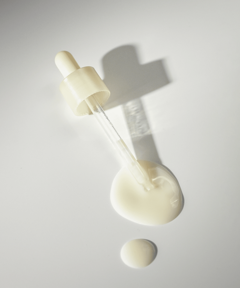 Dropper with ABIB Resurrection Bifida Serum Firming Drops 50ml on a white surface