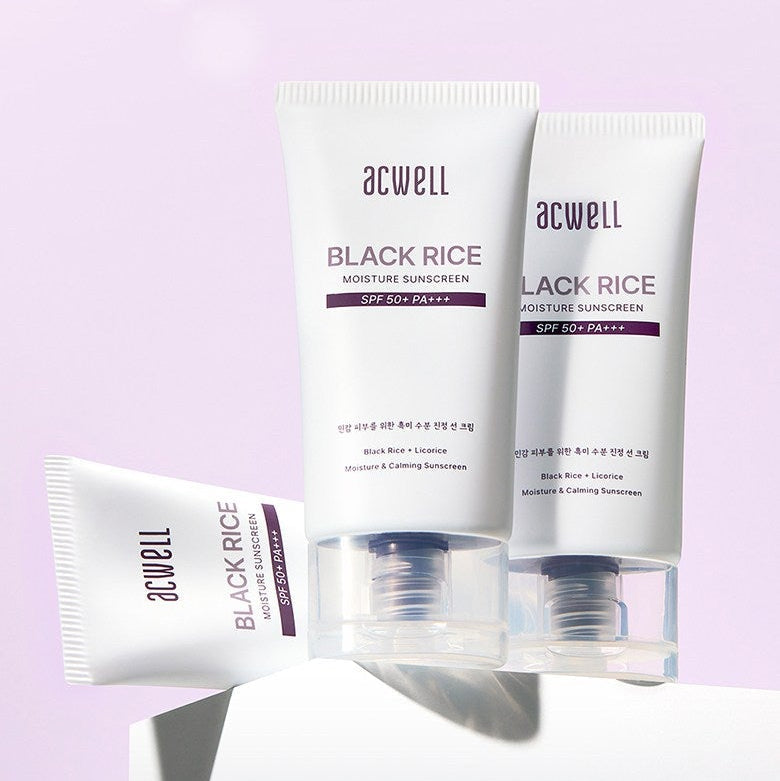 ACWELL Black Rice Moisture Sunscreen SPF50+ PA+++, 50ml packaging on a pastel background