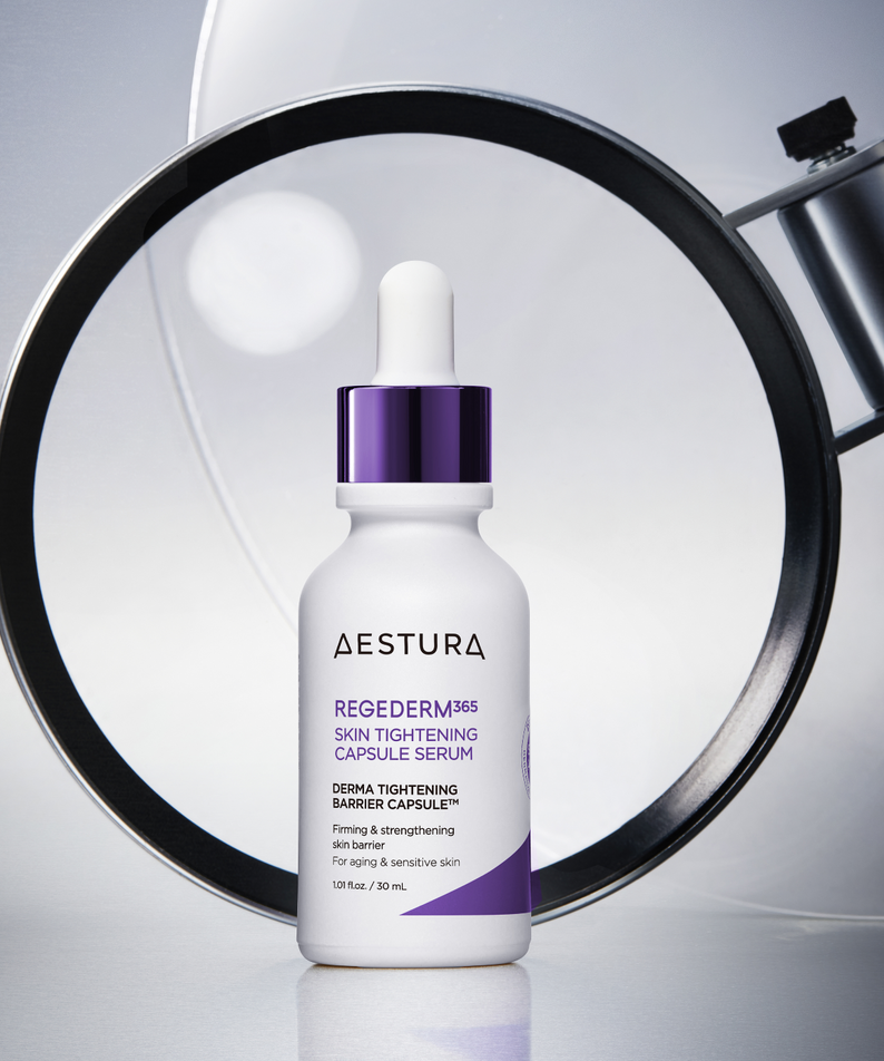AESTURA Rizederm 365 Skin Tightening Capsule Serum 30ml bottle with magnifying glass background, enhancing skincare benefits.