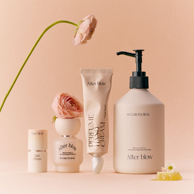 AFTER BLOW Perfume Hand Wash Sugar Floral 400ml bottle surrounded by floral elements.