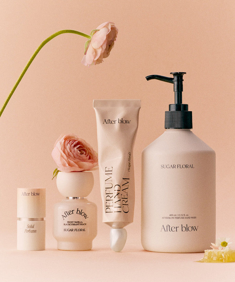 AFTER BLOW Perfume Hand Wash Sugar Floral 400ml bottle surrounded by floral elements.
