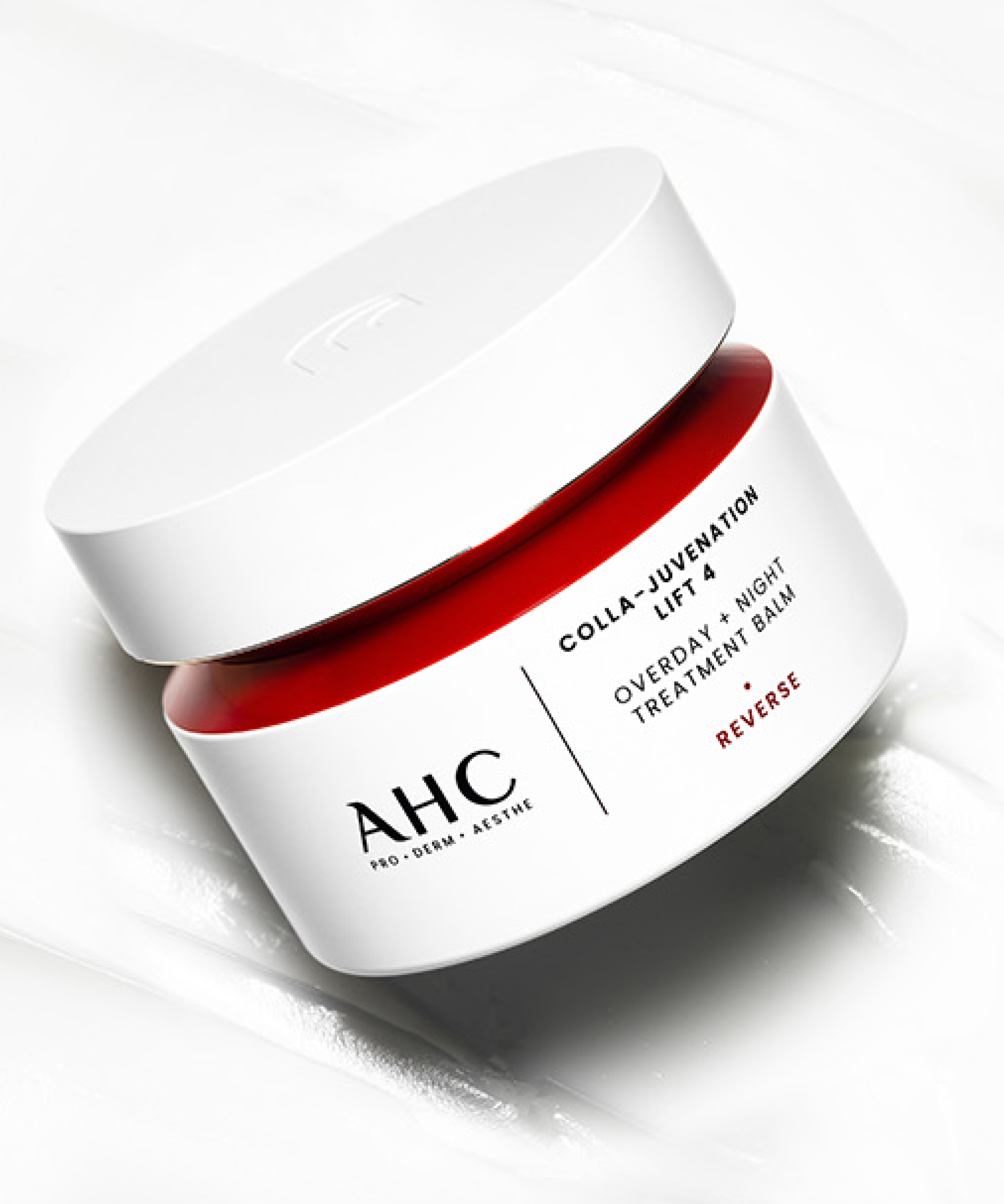 AHC Cola Juvenation Lift 4 Overday Night Treatment Balm 50ml in white jar on textured surface