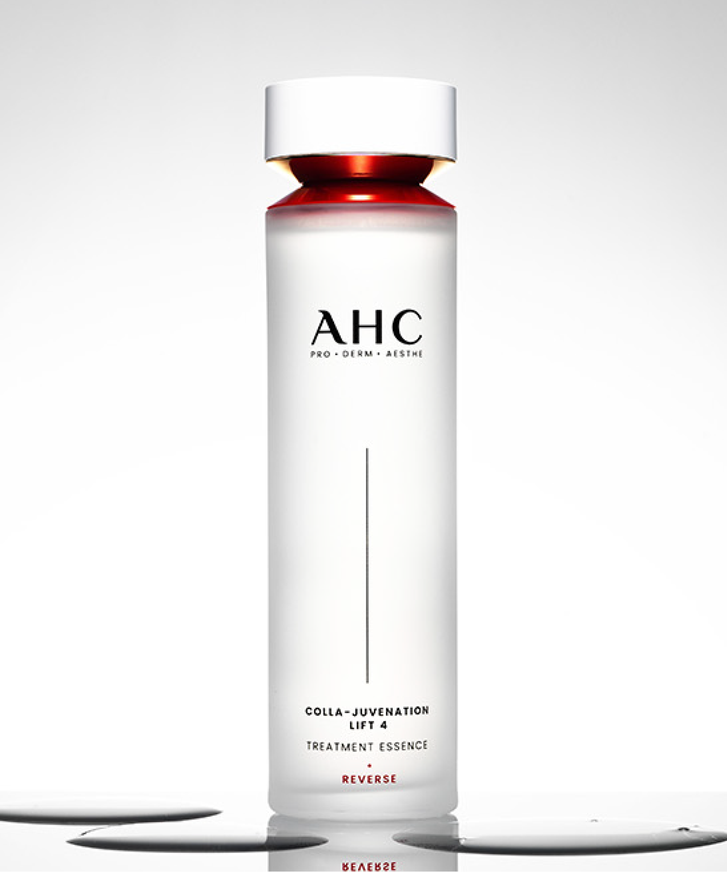 AHC Cola Juvenation Lift 4 Treatment Essence 130ml bottle on a reflective surface, highlighting skincare benefits and elegant design.