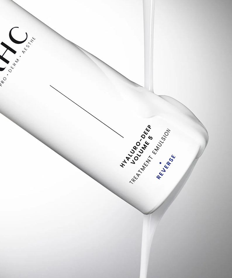 AHC Hyaluro Deep Volume 5 Treatment Essence 130ml bottle with pouring essence