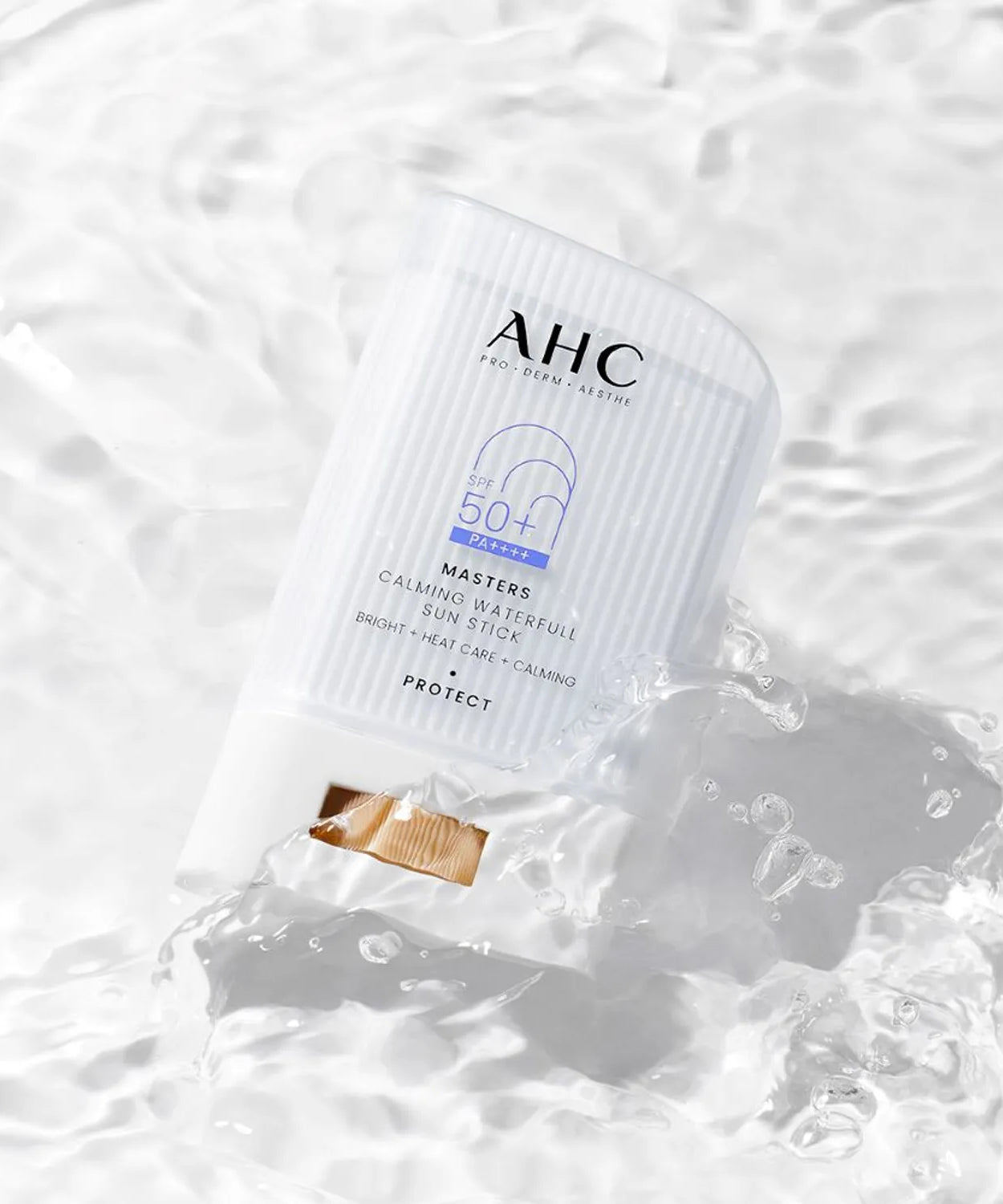 AHC Masters Calming Waterfull Sun Stick 22g on rippling water surface