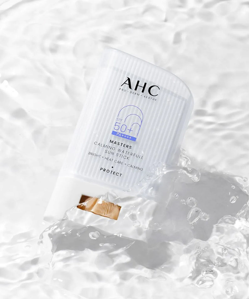 AHC Masters Calming Waterfull Sun Stick 22g on rippling water surface