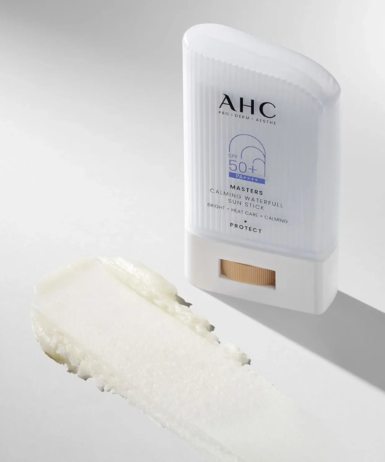 AHC Masters Calming Waterfull Sun Stick 22g SPF 50 formula displayed next to the product, highlighting texture and packaging.