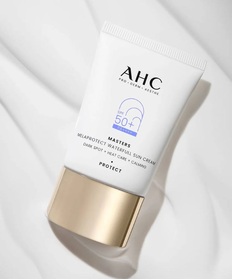 AHC Masters Mela Protect Waterfull Sunscreen 40ml tube against a soft background, showcasing SPF 50+ protection and premium packaging.
