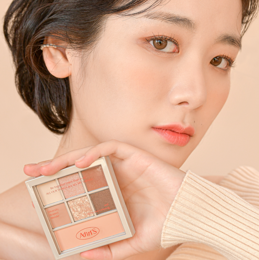 Person holding ALL MY THING I'm Your Palette makeup set close-up.
