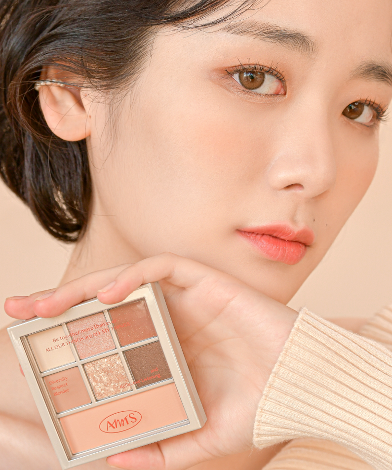 Person holding ALL MY THING I'm Your Palette makeup set close-up.