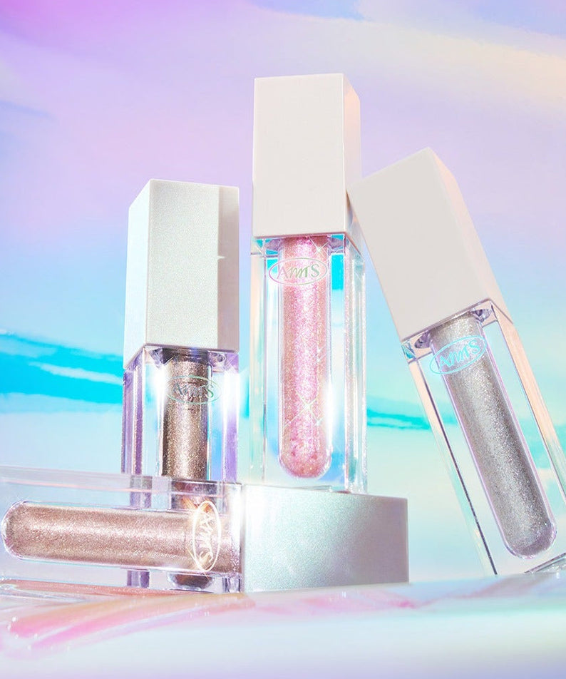 ALL MY THING Kiss Your Eye Glitter Liquid Eyeshadow in pink and silver shades against a pastel background