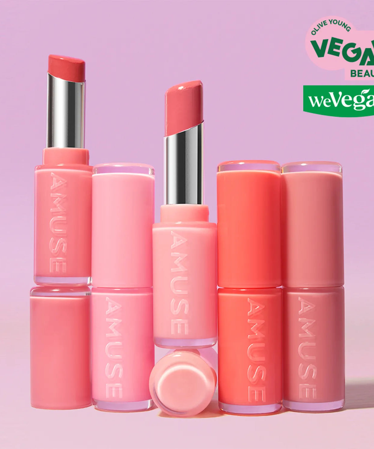 AMUSE Fondue Balm lipsticks in various shades with vegan certified labels.